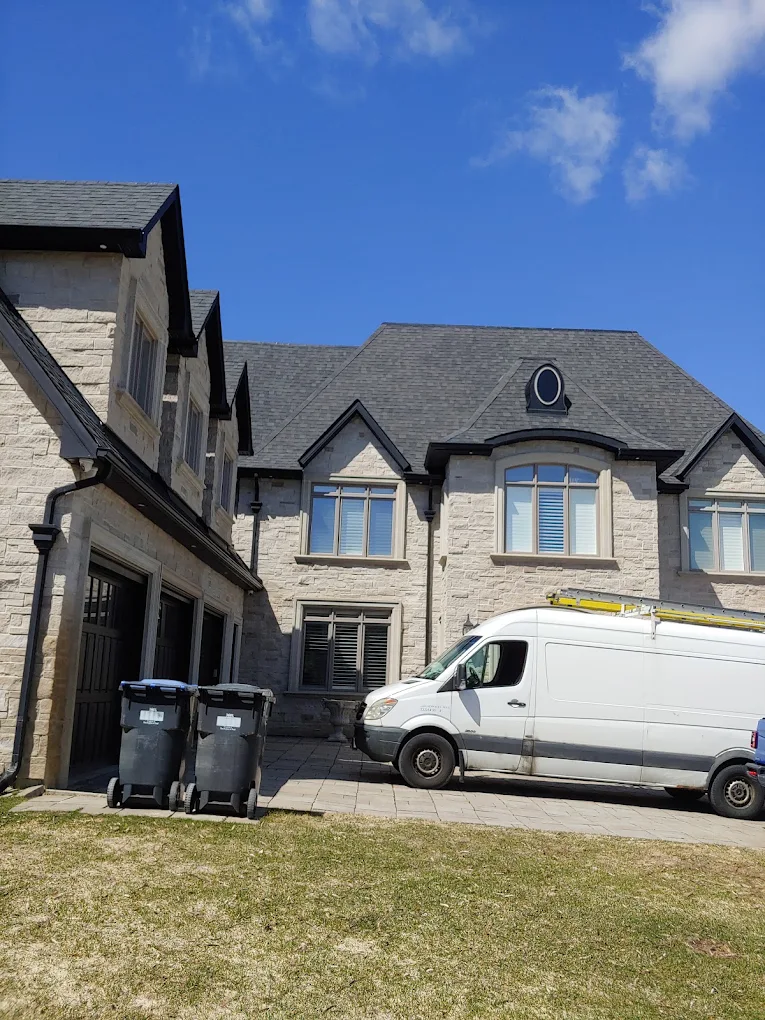 Full shingle replacement — stone home